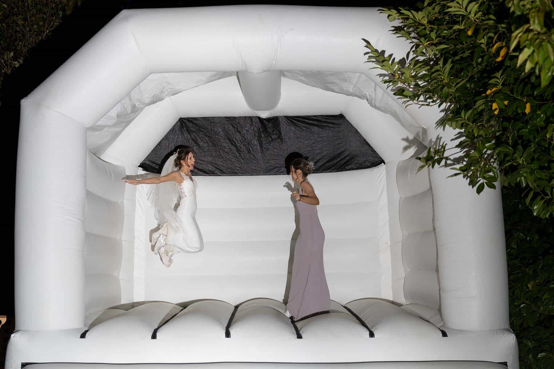 Bride on a bouncy castle