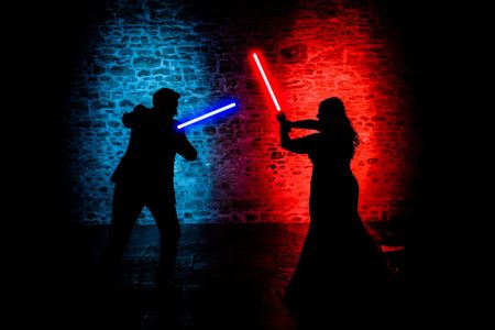 Winter Wedding Photography-1 Star Wars Themed Wedding photo of Couple playing with lightsabers