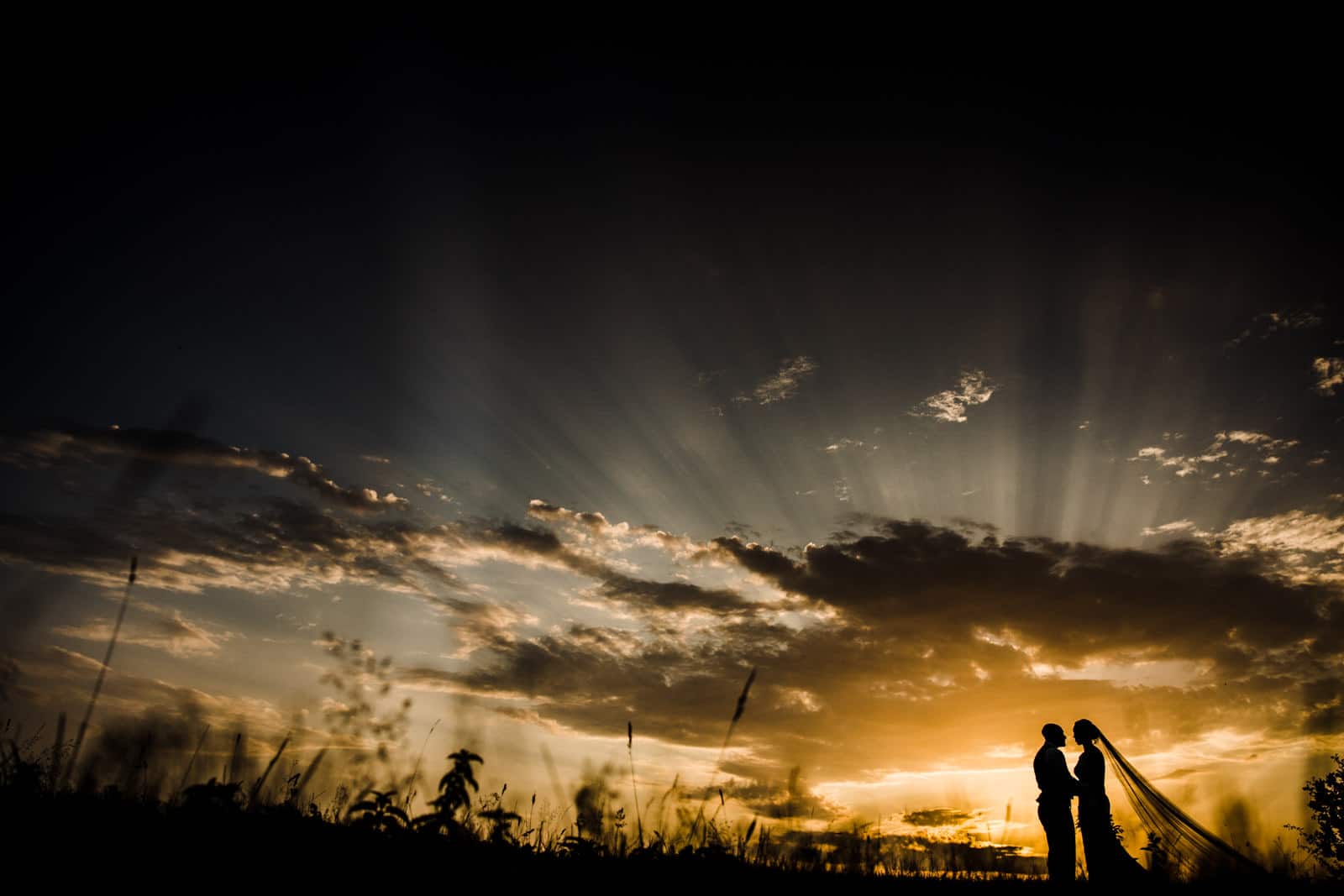 Amazing silhouette, of bride and groom, beautiful sunset Cotswolds Wedding Photographers