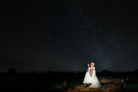 Best of Sky Photography 2021-10 Wedding Photographers capturing a mesmerizing starry sky moment of a bride and groom in Northampton.