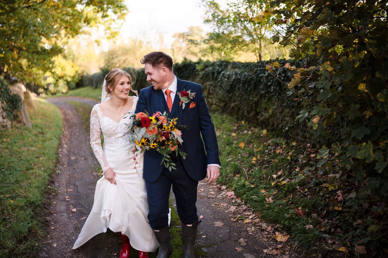 Walking in wellington boots at a wedding
